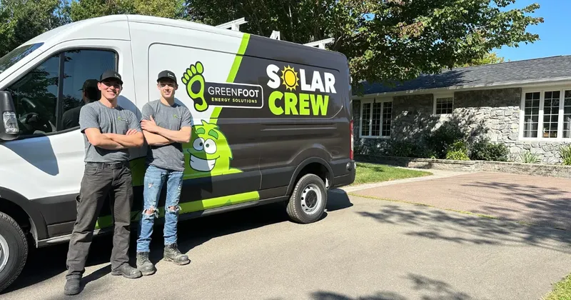 Greenfoot solar installation service van parked at residential project site